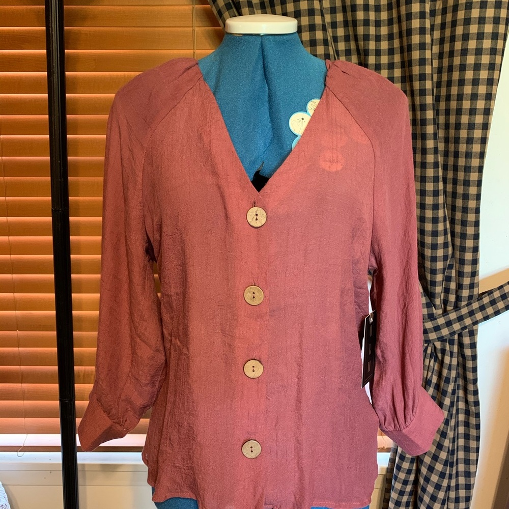 New with tags never worn Size Medium